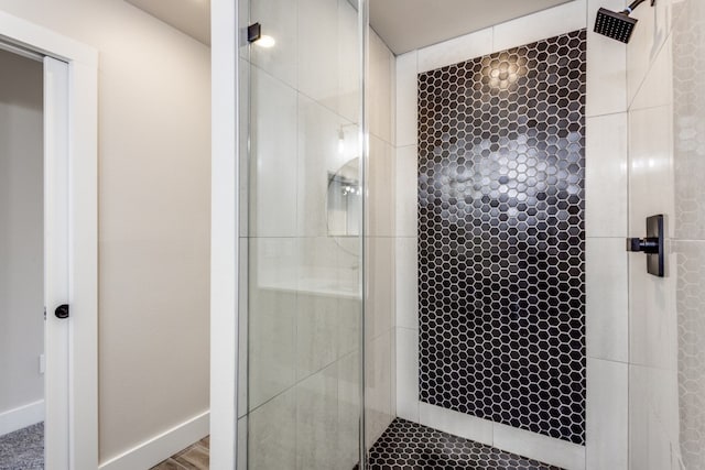 bathroom featuring an enclosed shower