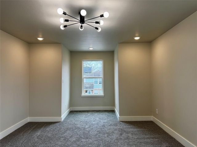 unfurnished room featuring carpet floors