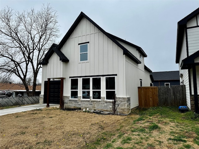 back of house with a yard