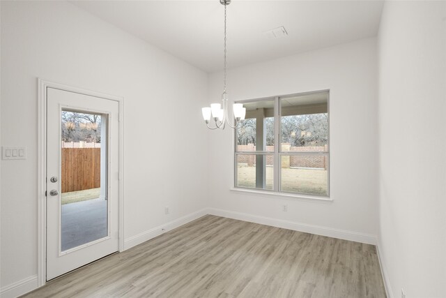 bathroom featuring a shower with shower door, vanity, and crown molding