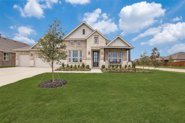 craftsman-style house with a garage and a front yard