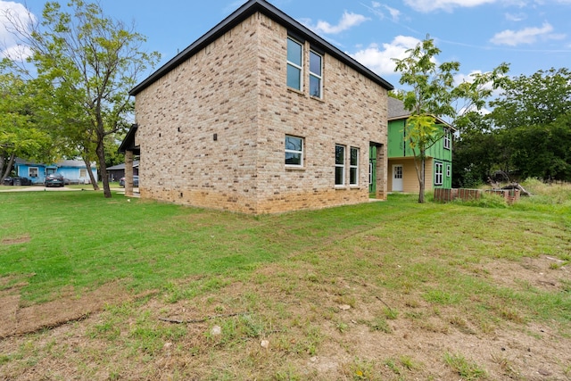 view of property exterior featuring a yard