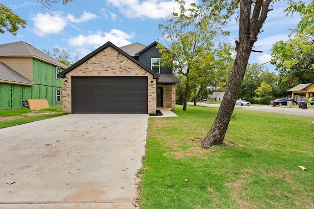 view of front facade featuring a front lawn and a garage