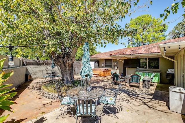 view of patio / terrace with a fenced in pool