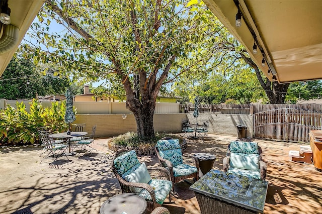 view of swimming pool with french doors and a patio