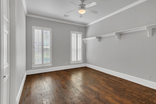 spare room with hardwood / wood-style flooring, ceiling fan, and crown molding