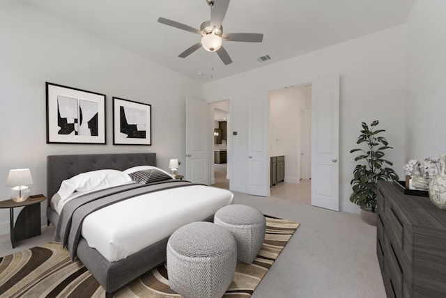 carpeted bedroom with ceiling fan