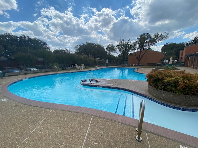 view of pool with a patio