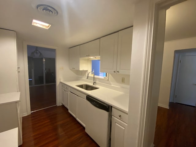 kitchen with stainless steel dishwasher, white cabinetry, sink, and dark hardwood / wood-style flooring