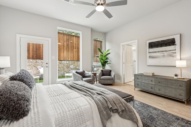 bedroom with ceiling fan and light hardwood / wood-style floors