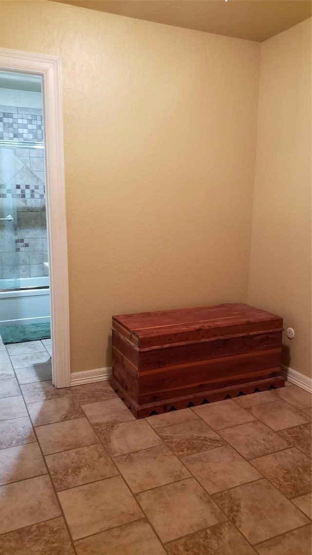 interior space featuring ensuite bath