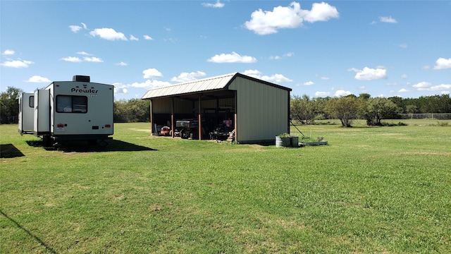 view of outdoor structure with a lawn