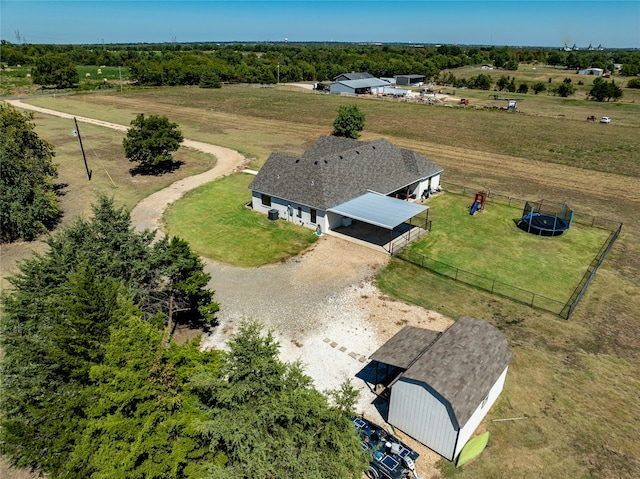 birds eye view of property featuring a rural view