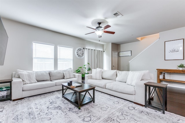 living room with ceiling fan