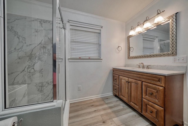 bedroom with crown molding, ceiling fan, a closet, and light hardwood / wood-style floors