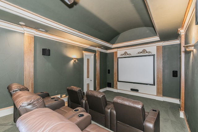 home theater room with lofted ceiling, carpet flooring, and decorative columns