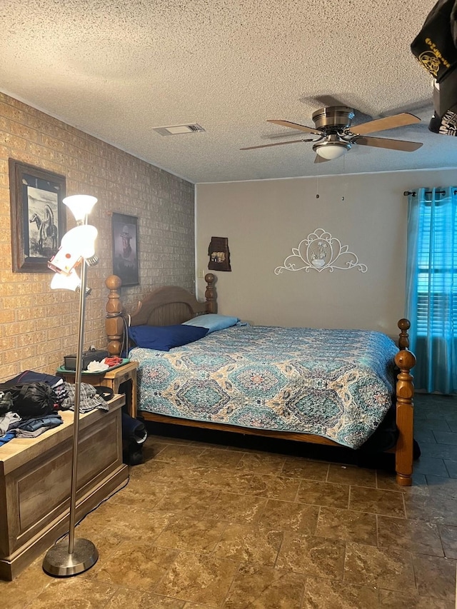 bedroom with visible vents, a textured ceiling, ceiling fan, and vaulted ceiling