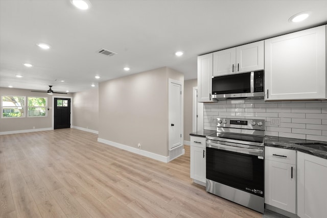 kitchen featuring light hardwood / wood-style flooring, white cabinets, appliances with stainless steel finishes, and ceiling fan