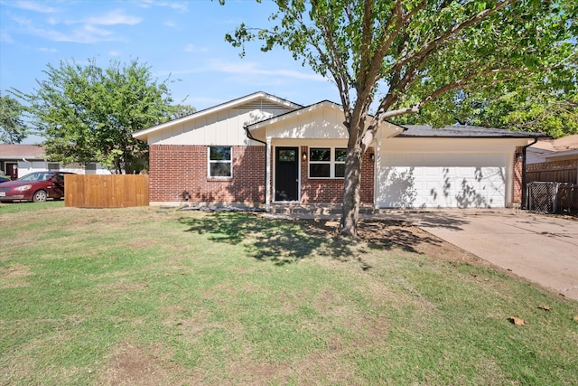 single story home featuring a front lawn and a garage