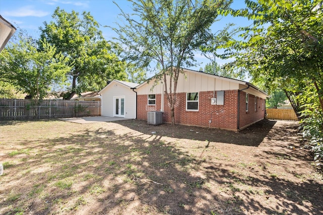 exterior space featuring cooling unit and a patio