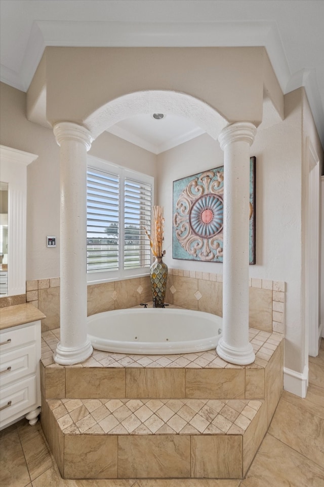 bathroom with vanity, ornamental molding, tile patterned flooring, and tiled bath