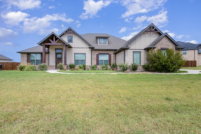 craftsman house with a front lawn