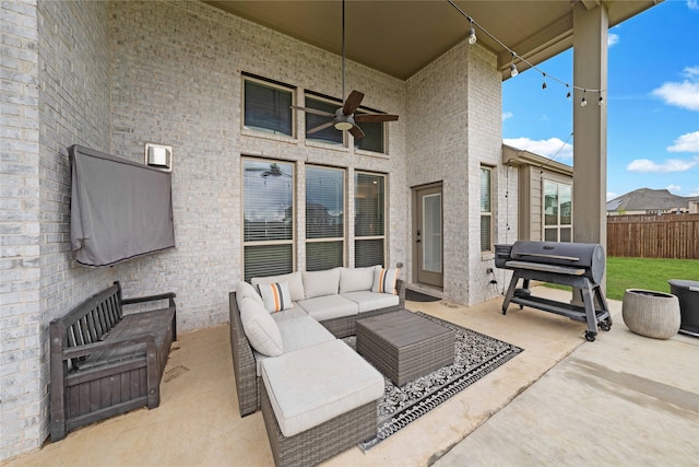 view of patio / terrace with grilling area, ceiling fan, and outdoor lounge area