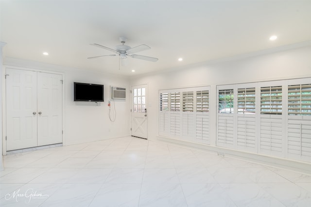 unfurnished room featuring ceiling fan, crown molding, and a wall mounted AC