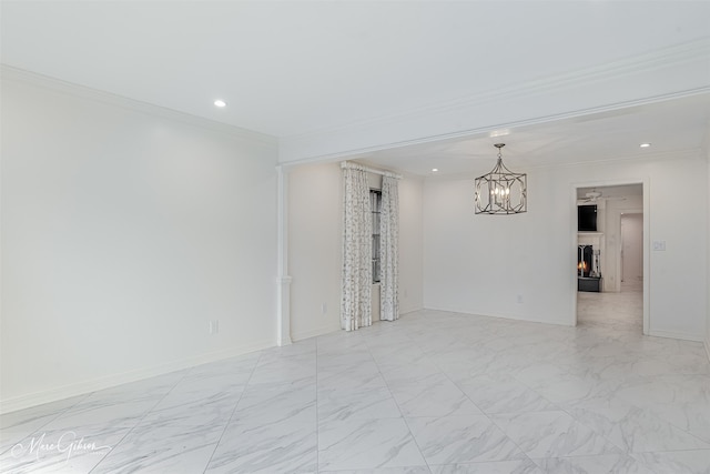 unfurnished room with marble finish floor, a lit fireplace, and ornamental molding