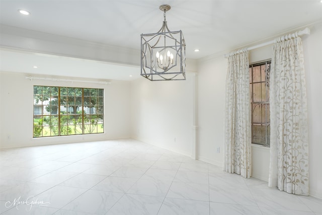 unfurnished room featuring recessed lighting, crown molding, baseboards, and an inviting chandelier