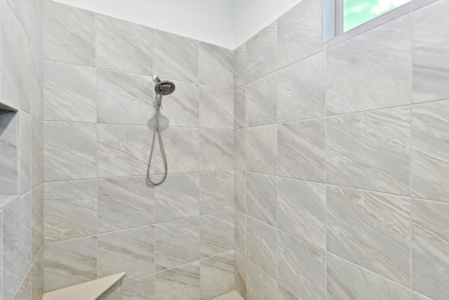 details with a tile shower