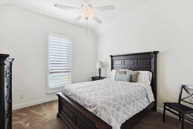 bedroom with carpet floors, lofted ceiling, and ceiling fan