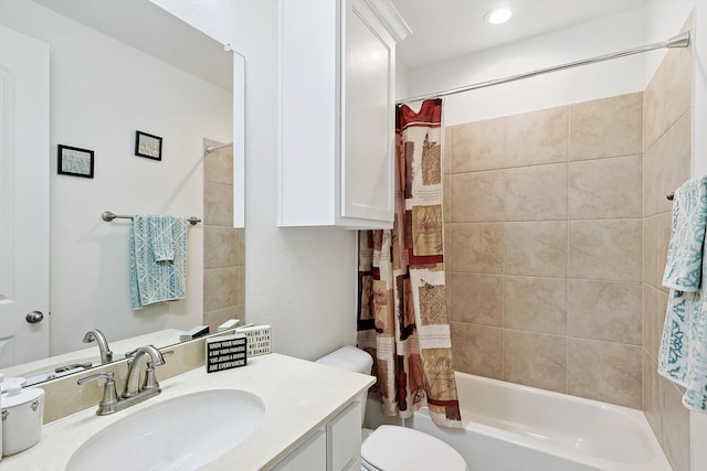 full bathroom featuring vanity, toilet, and shower / tub combo with curtain