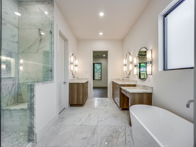 bathroom with vanity and plus walk in shower