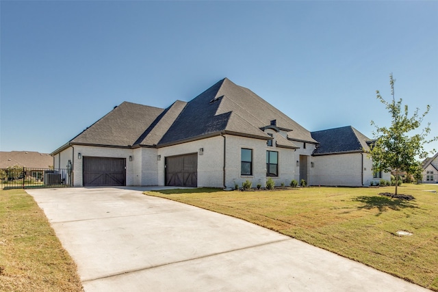 1140 Macgregor Ln, Gunter, TX 75058 - view of front facade with an attached garage, concrete driveway, central AC unit, and roof with shingles