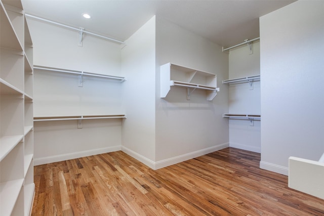 1140 Macgregor Ln, Gunter, TX 75058 - spacious closet with wood finished floors