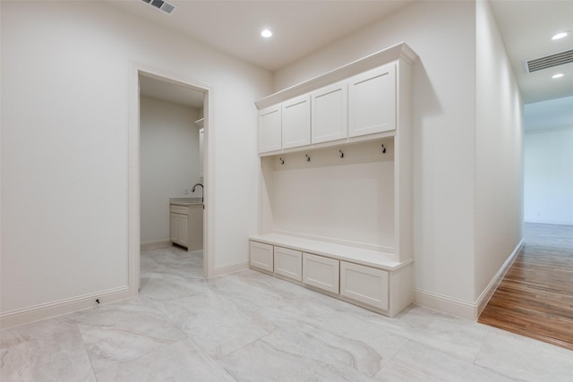 1140 Macgregor Ln, Gunter, TX 75058 - mudroom featuring a sink, recessed lighting, and baseboards