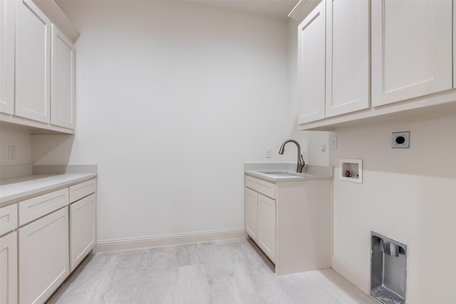 1140 Macgregor Ln, Gunter, TX 75058 - washroom featuring hookup for an electric dryer, cabinet space, hookup for a washing machine, and baseboards
