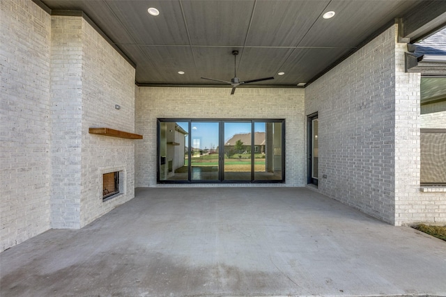 1140 Macgregor Ln, Gunter, TX 75058 - view of patio / terrace featuring an outdoor brick fireplace and ceiling fan