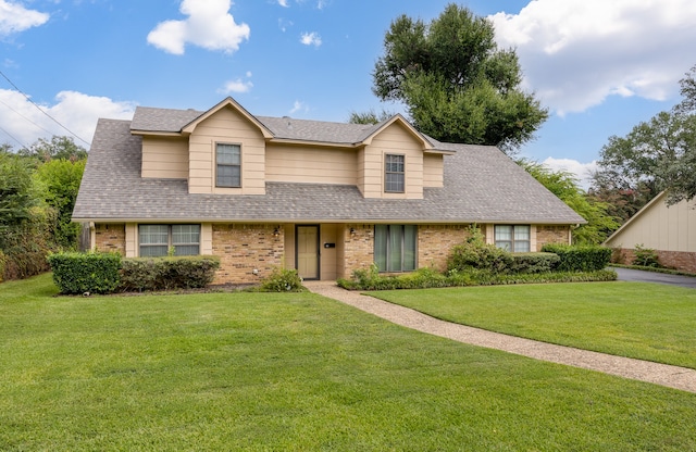 view of front of property with a front lawn