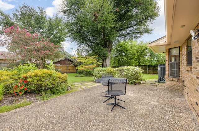 view of patio with central AC