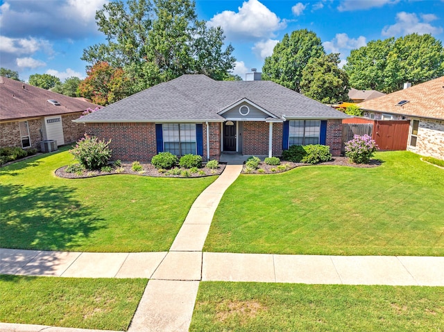 single story home featuring central AC and a front yard