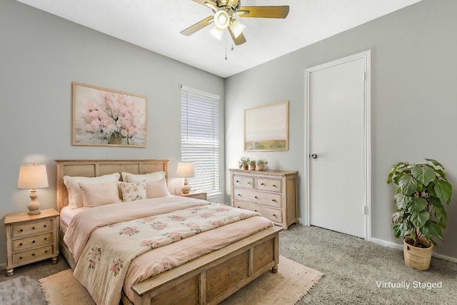 bedroom featuring ceiling fan and light colored carpet