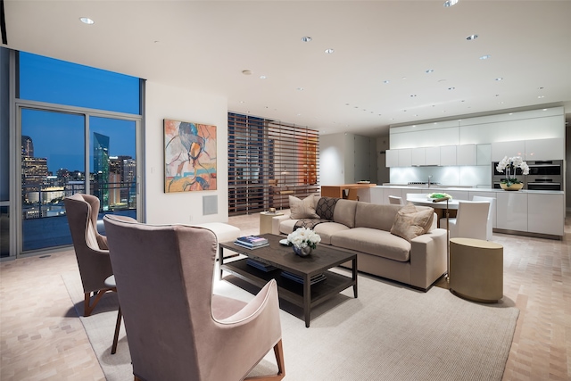 living room featuring light parquet flooring