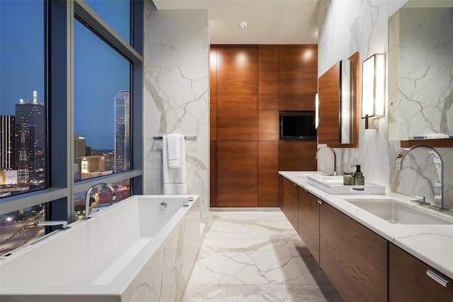 bathroom with a bathtub and vanity