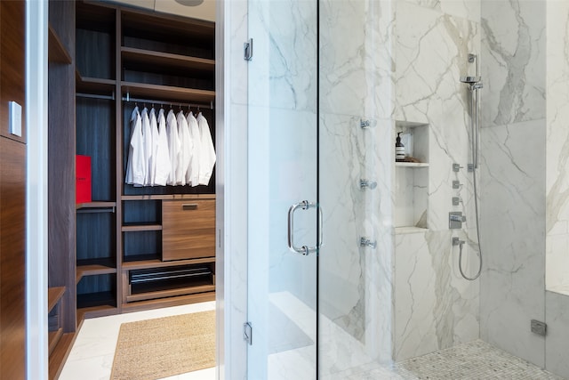 bathroom featuring an enclosed shower