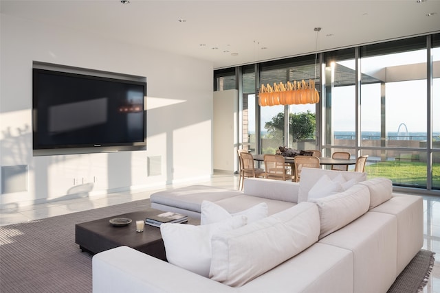 living room featuring floor to ceiling windows