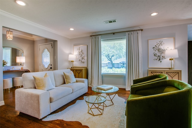 living room with crown molding and dark hardwood / wood-style flooring