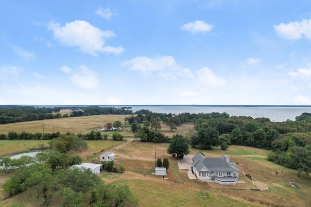 bird's eye view with a water view and a rural view