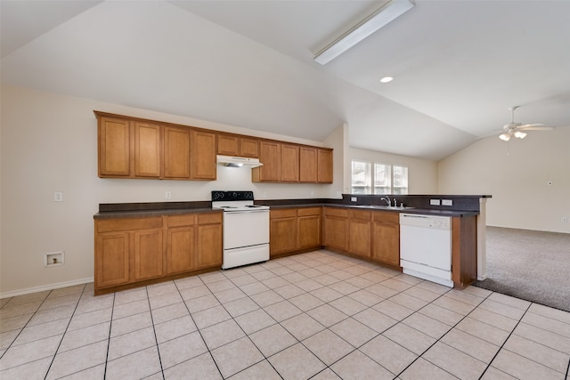 kitchen featuring white appliances, sink, lofted ceiling, light tile patterned flooring, and ceiling fan